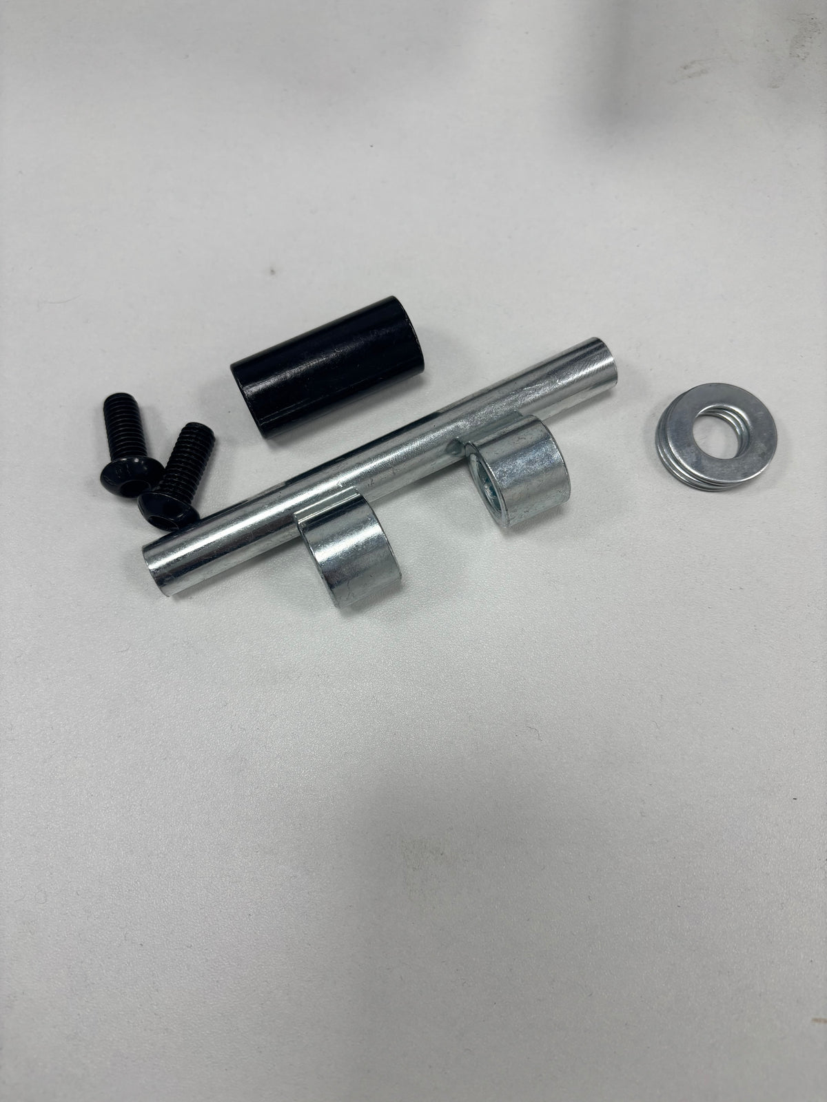 Front shock absorber shaft + spacer for GT08 scooters.